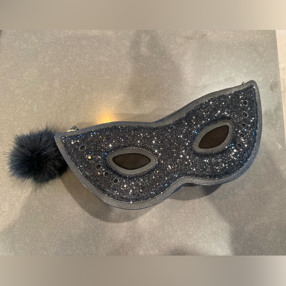 kate spade black glitter masquerade wristlet clutch with pom pom